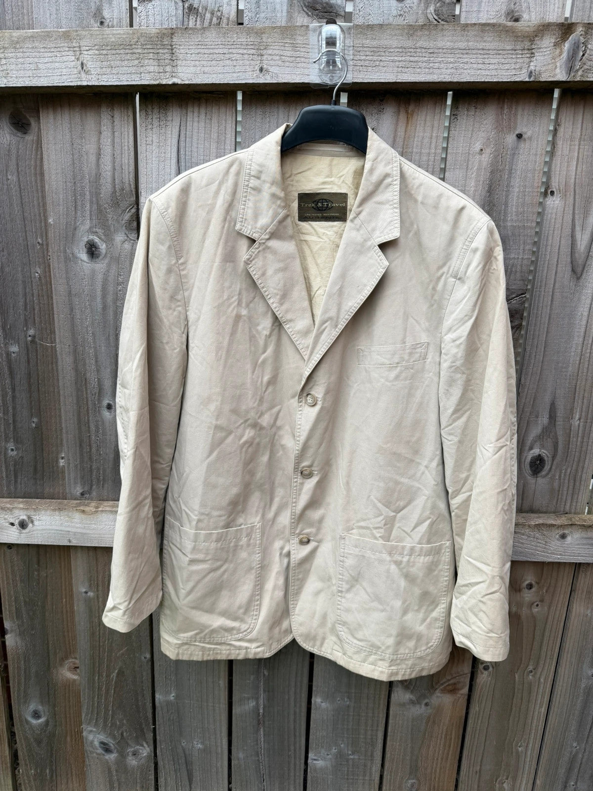 TREK cream lightweight utility blazer jacket with multiple pockets and casual safari style.