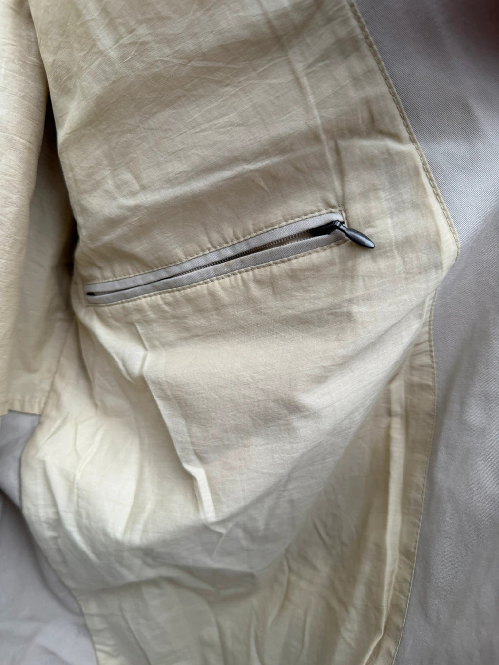 TREK cream lightweight utility blazer jacket with multiple pockets and casual safari style.