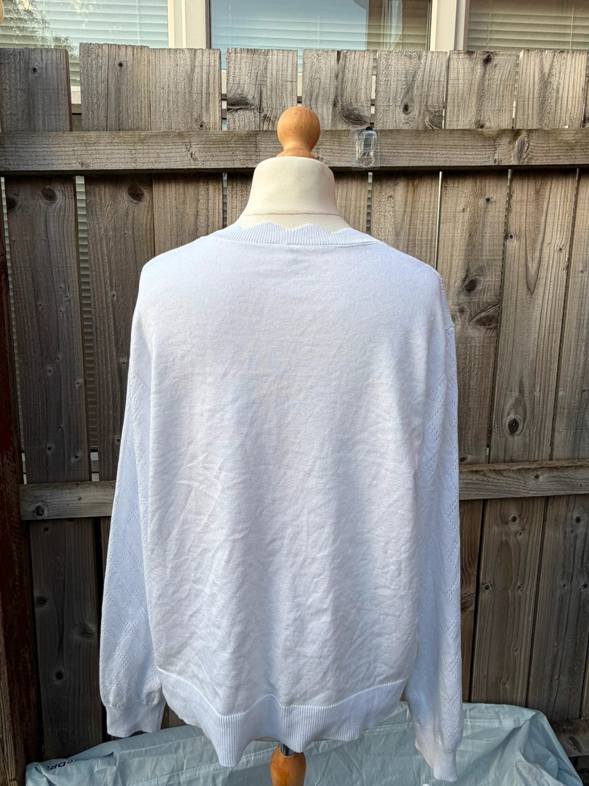 Whites white knit cardigan with scallop edge and button-up front, soft material.
