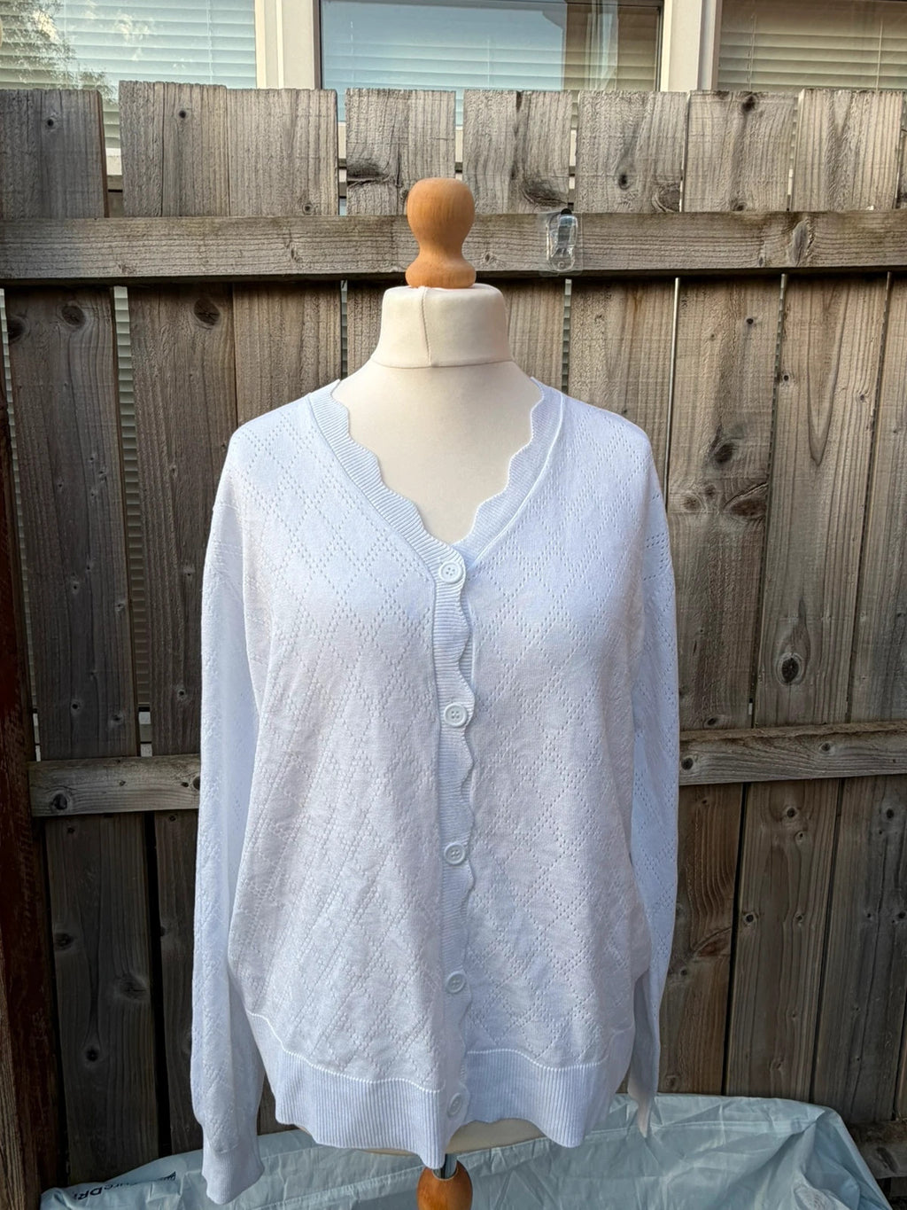 Whites white knit cardigan with scallop edge and button-up front, soft material.