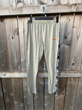 Ellesse khaki leggings with logo side stripe, stretchy material, pre-loved condition.