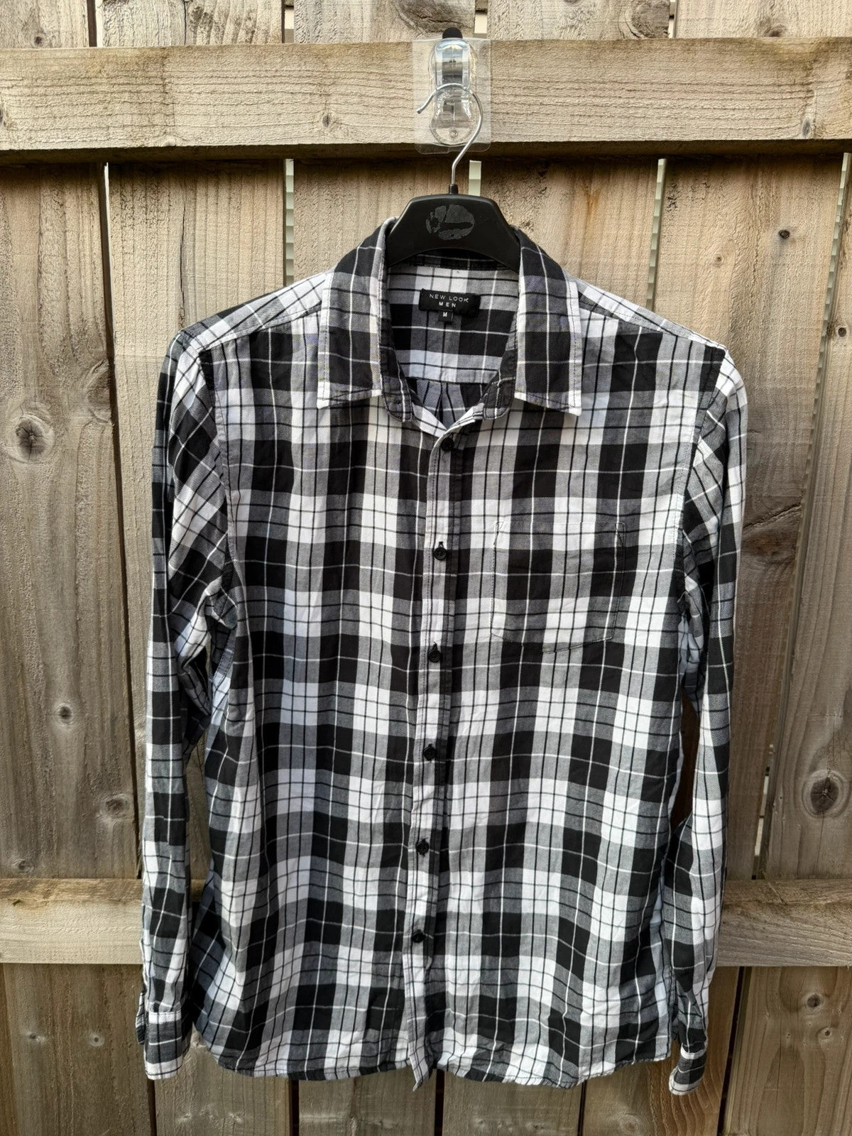 New Look men's black and white check shirt with long sleeves and button-up front.