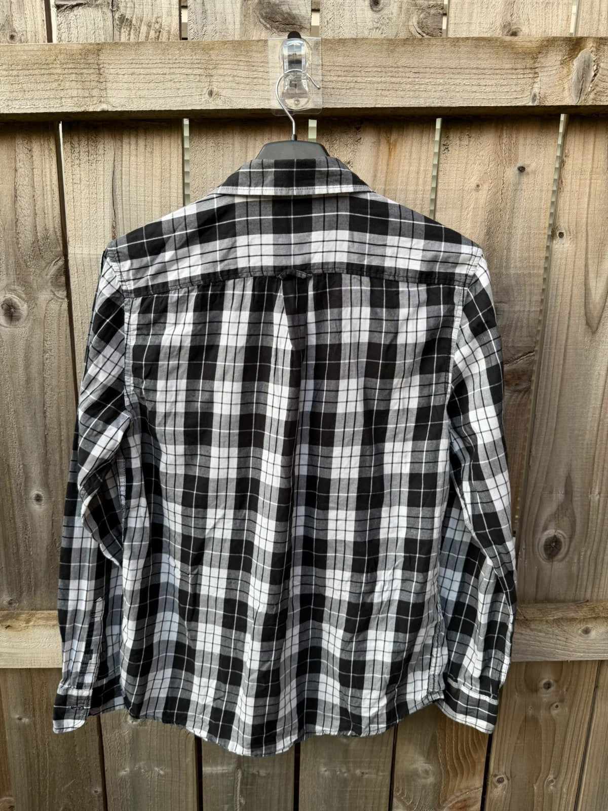 New Look men's black and white check shirt with long sleeves and button-up front.