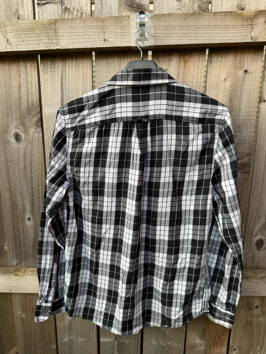 New Look men's black and white check shirt with long sleeves and button-up front.