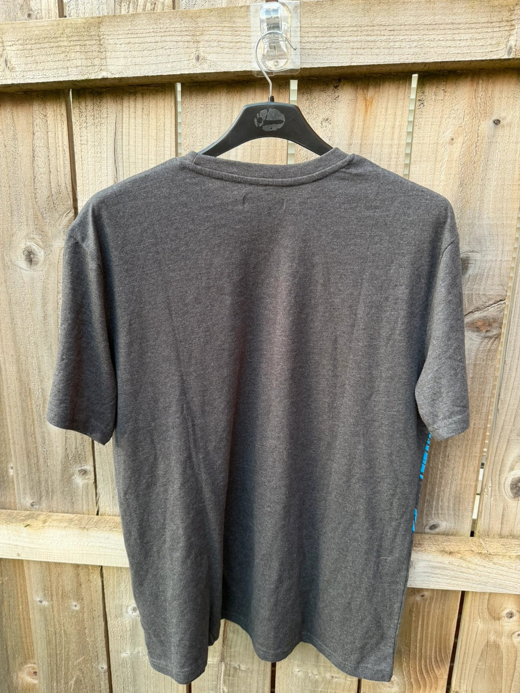 Atlas for Men blue and grey graphic t-shirt with athletic design and logo.