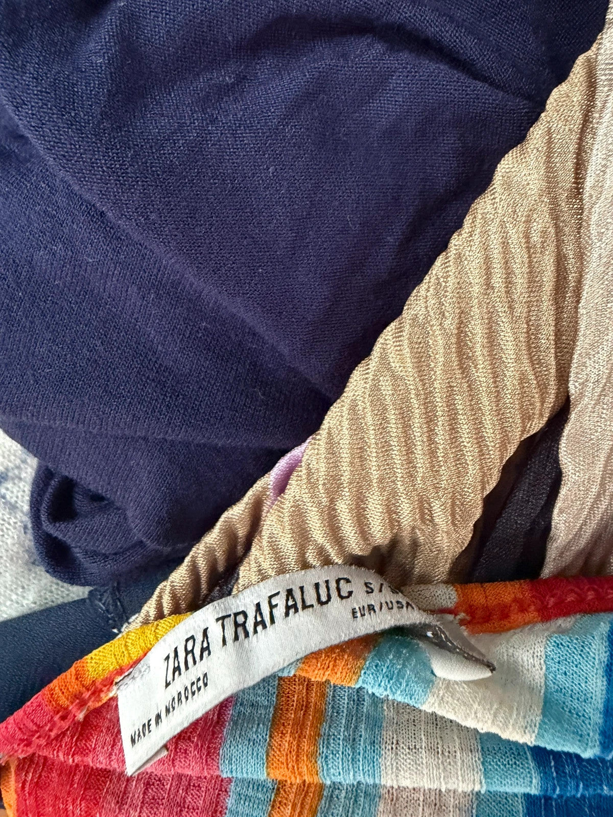 Zara multi-coloured striped sleeveless vest with vibrant Y2K festival style.