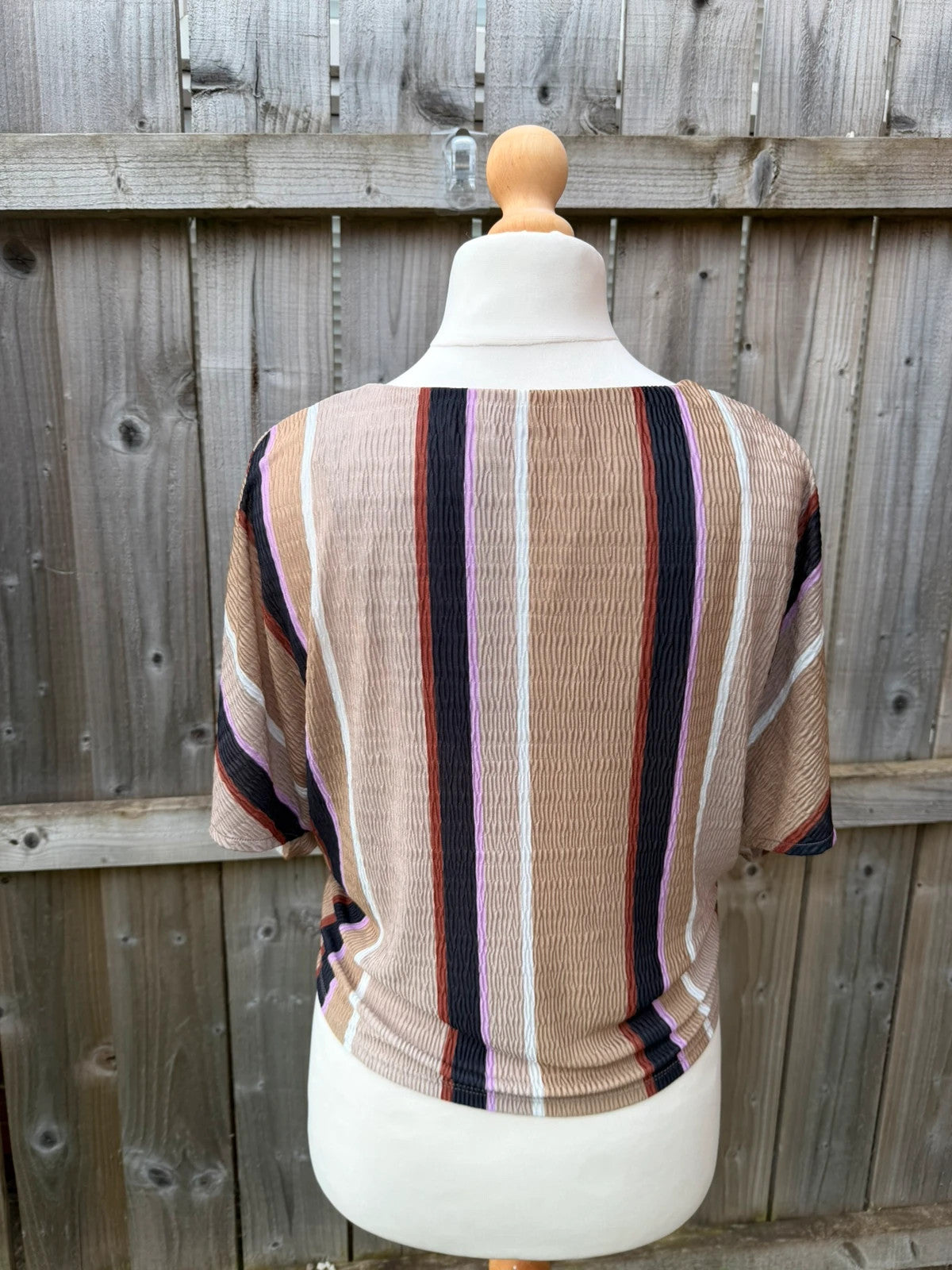 Marks & Spencer multi tunic blouse with textured fabric and wrap twist front design.