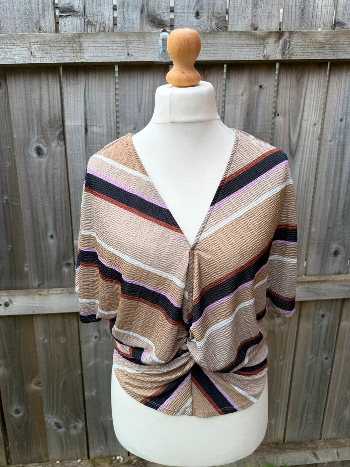 Marks & Spencer multi tunic blouse with textured fabric and wrap twist front design.