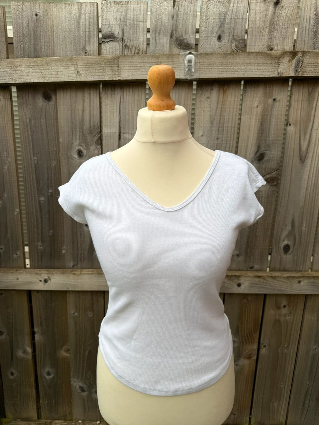 Topshop white pocket t-shirt with ribbed texture and short sleeves.