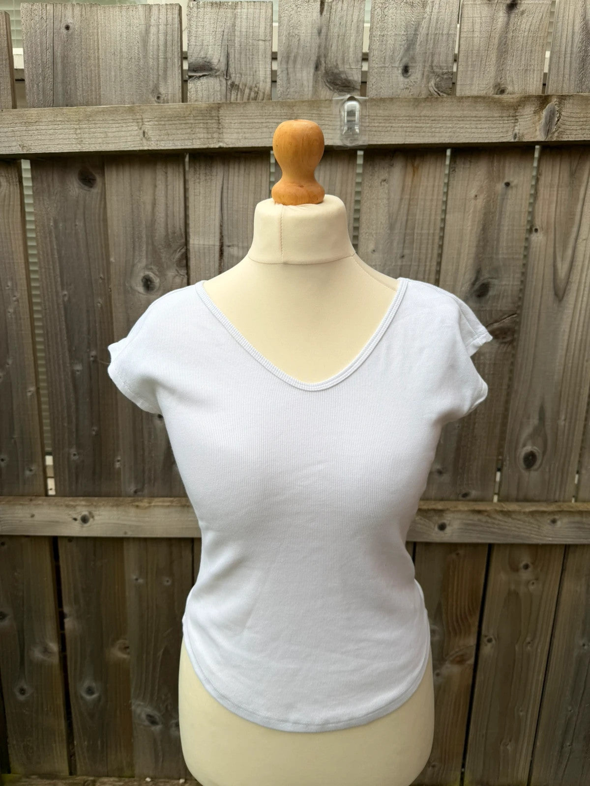 Topshop white pocket t-shirt with ribbed texture and short sleeves.