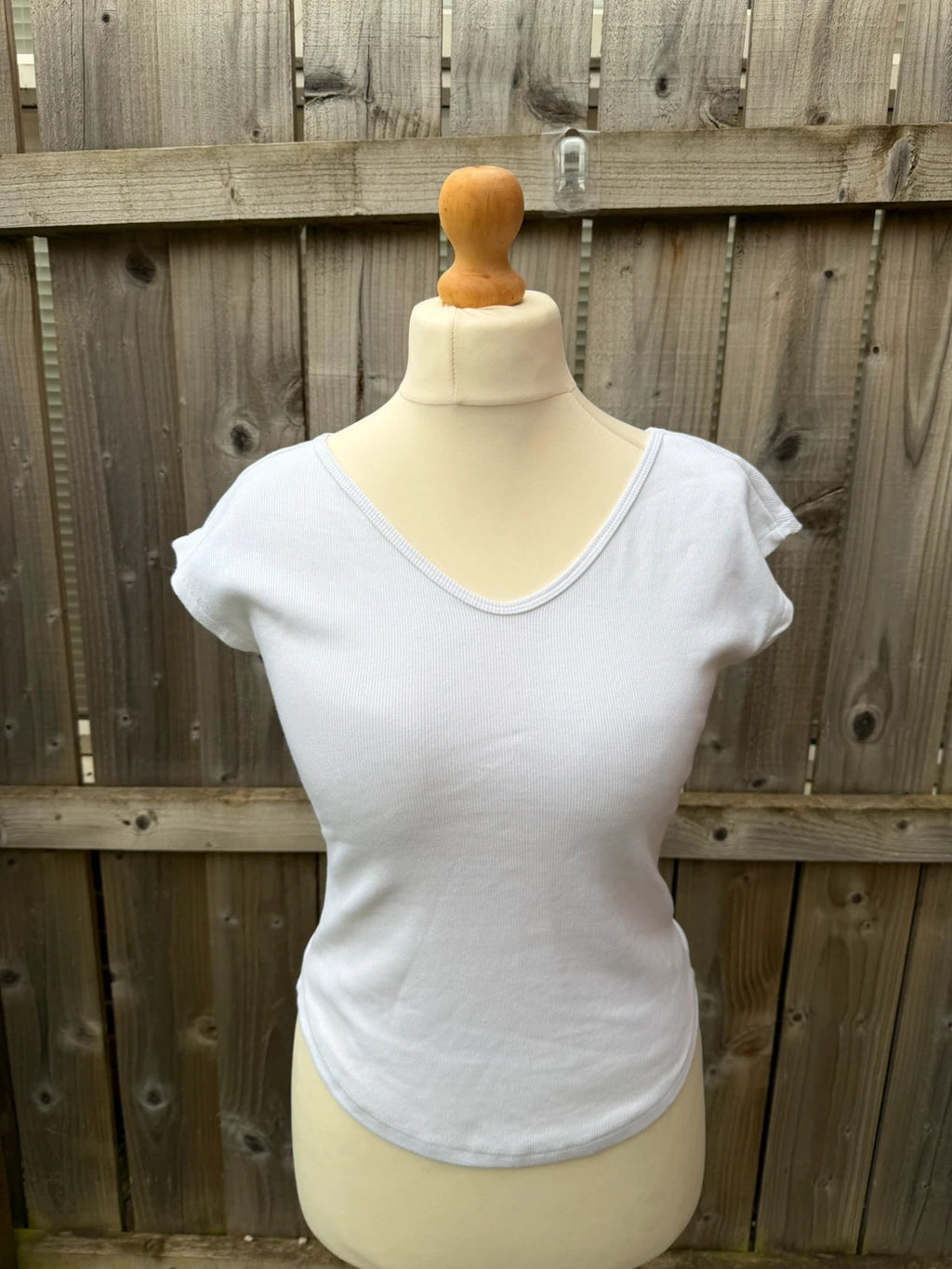 Topshop white pocket t-shirt with ribbed texture and short sleeves.