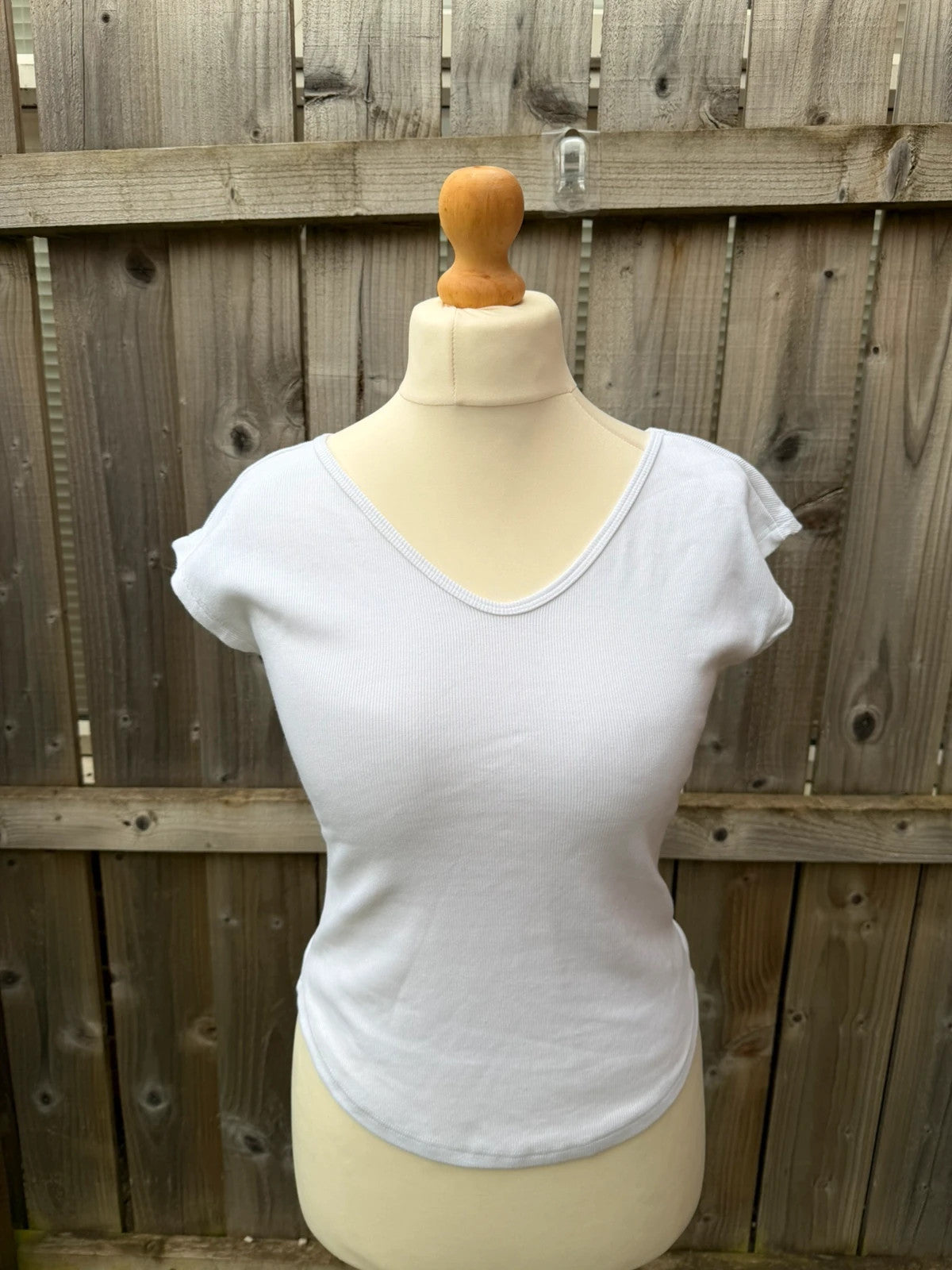Topshop white pocket t-shirt with ribbed texture and short sleeves.