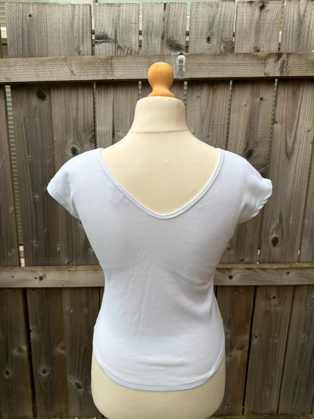 Topshop white pocket t-shirt with ribbed texture and short sleeves.