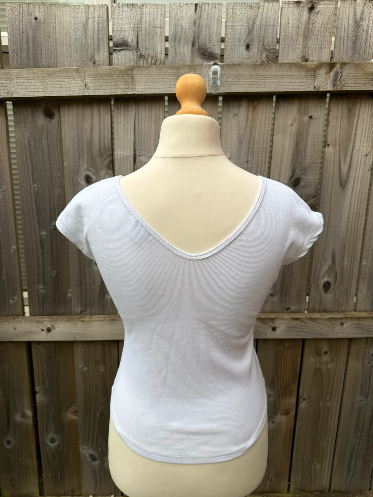 Topshop white pocket t-shirt with ribbed texture and short sleeves.