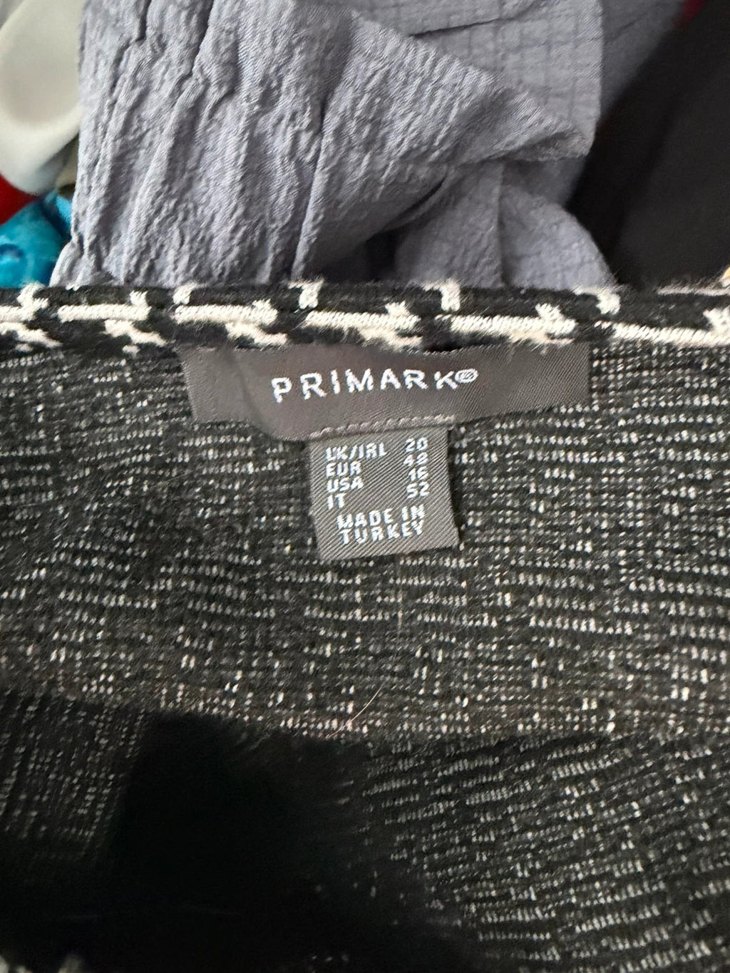 Primark black and white houndstooth midi dress with long sleeves and pockets.