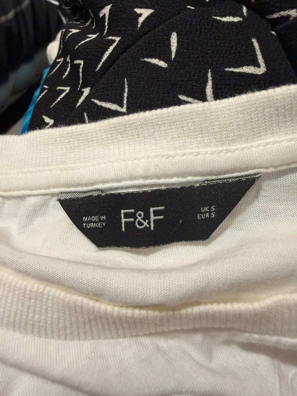 F&F white pocket t-shirt with embroidered details and puff sleeves, pre-loved.