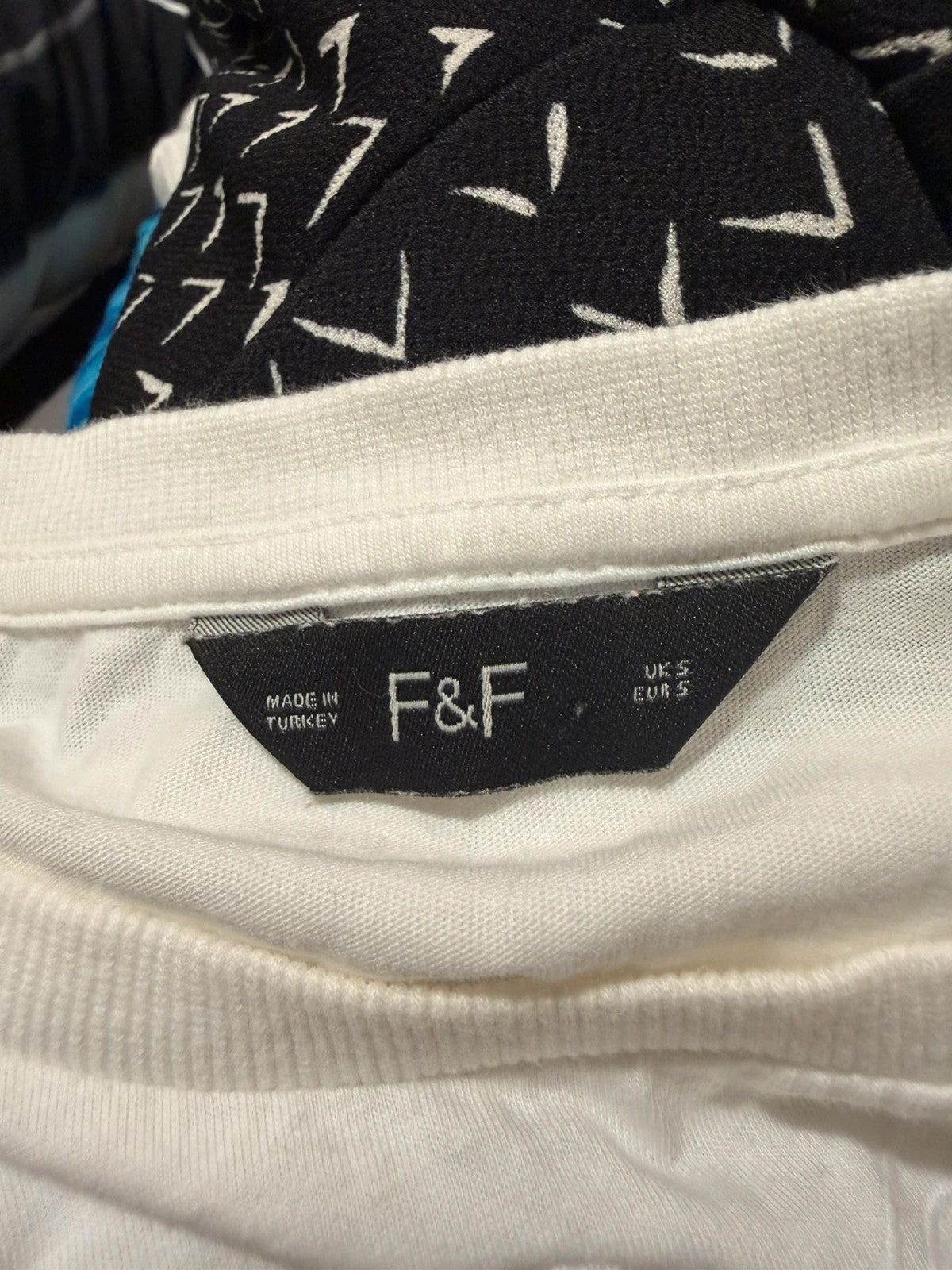 F&F white pocket t-shirt with embroidered details and puff sleeves, pre-loved.