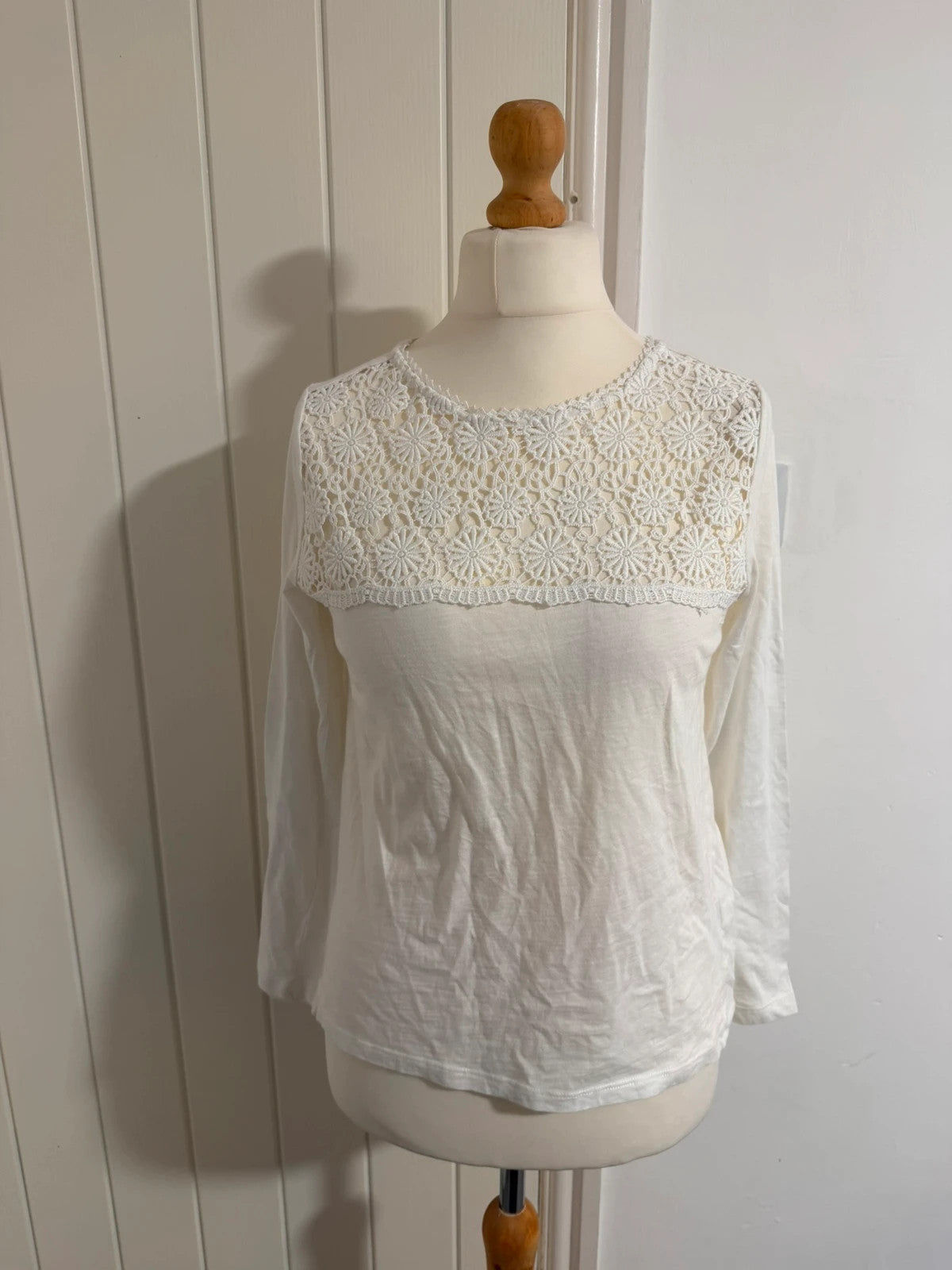 Falmer Heritage white tunic blouse with lace detail and long sleeves.