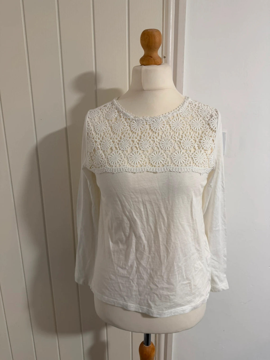 Falmer Heritage white tunic blouse with lace detail and long sleeves.