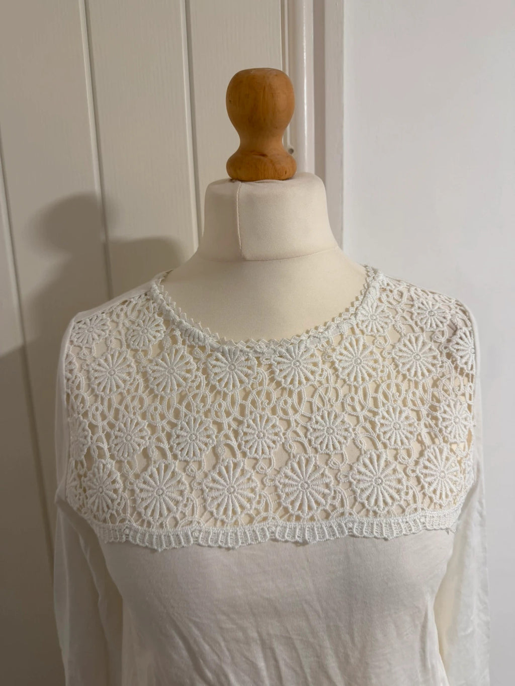 Falmer Heritage white tunic blouse with lace detail and long sleeves.
