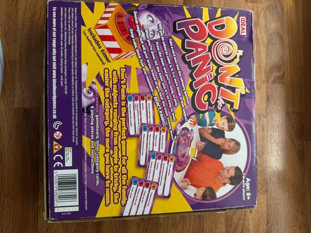 Don't Panic board game blue, cream, green box with playful graphics and complete set.