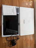 Universal black digital photo frame with remote, sleek design, pre-loved condition.