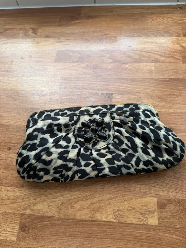 E-vie brown leopard print clutch bag with statement design and sleek finish.