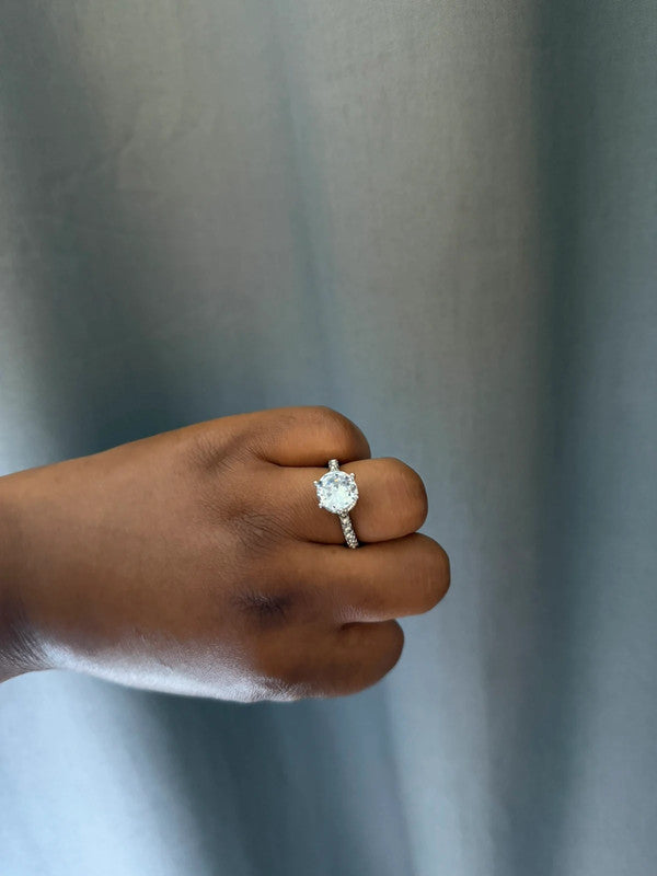 Fashions silver statement ring with diamond-like embellishments, pre-loved engagement style.