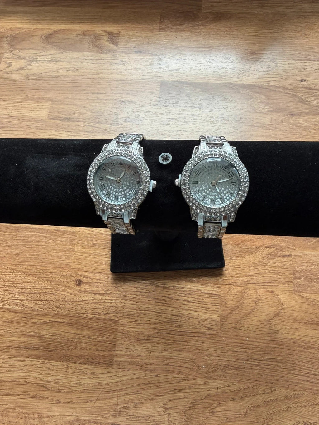 For Women silver wrist watch adorned with rhinestones, stylish and elegant design.