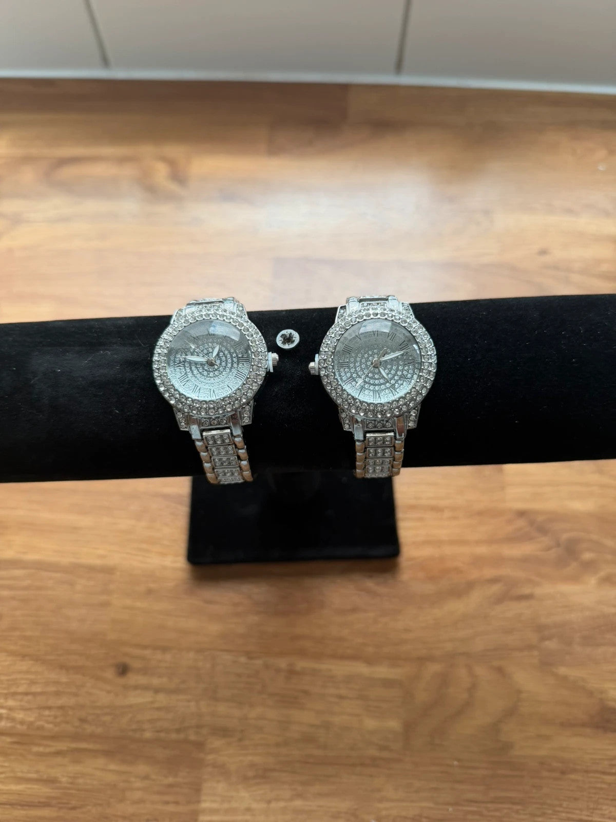 For Women silver wrist watch adorned with rhinestones, stylish and elegant design.