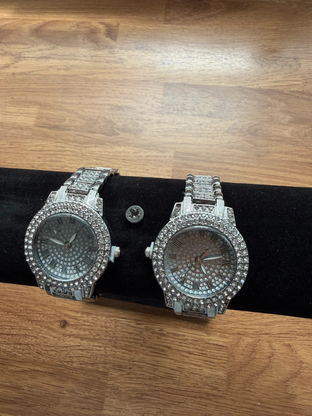 For Women silver wrist watch adorned with rhinestones, stylish and elegant design.