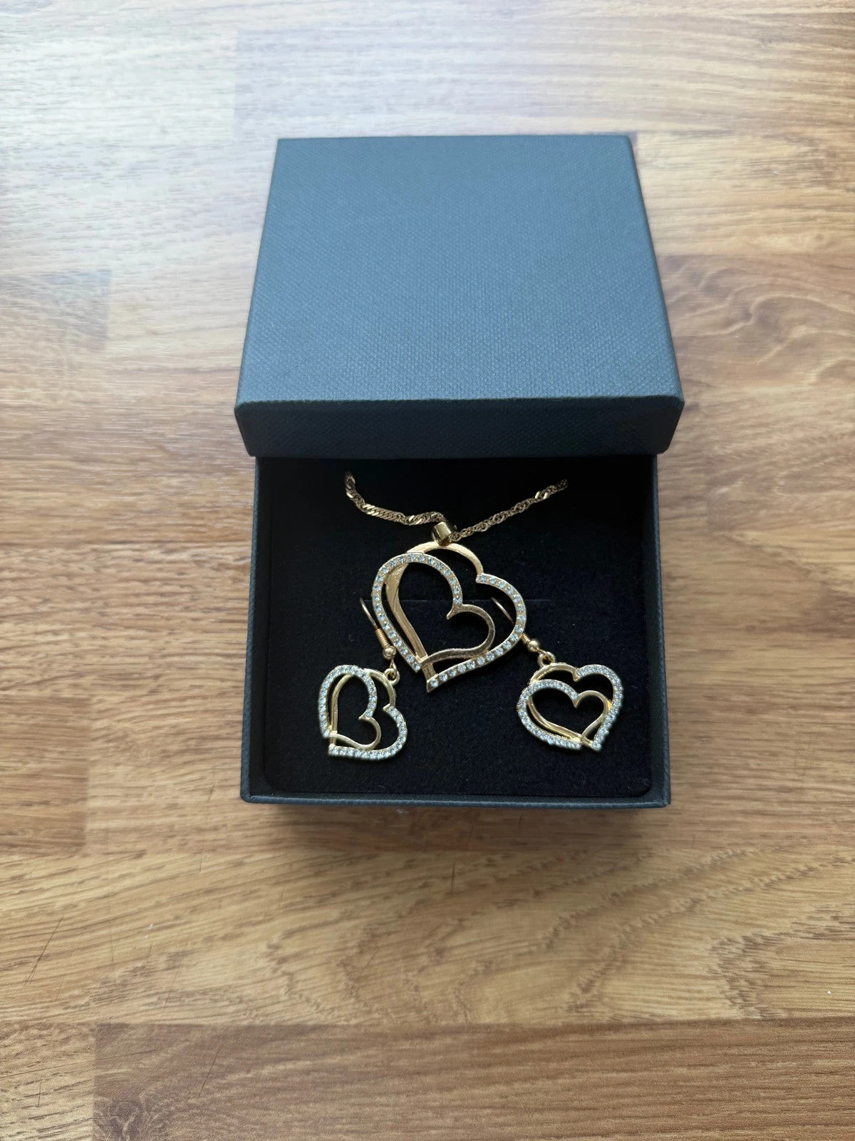 Chloe gold heart pendant necklace and earrings set, luxury statement jewellery, new without tags.