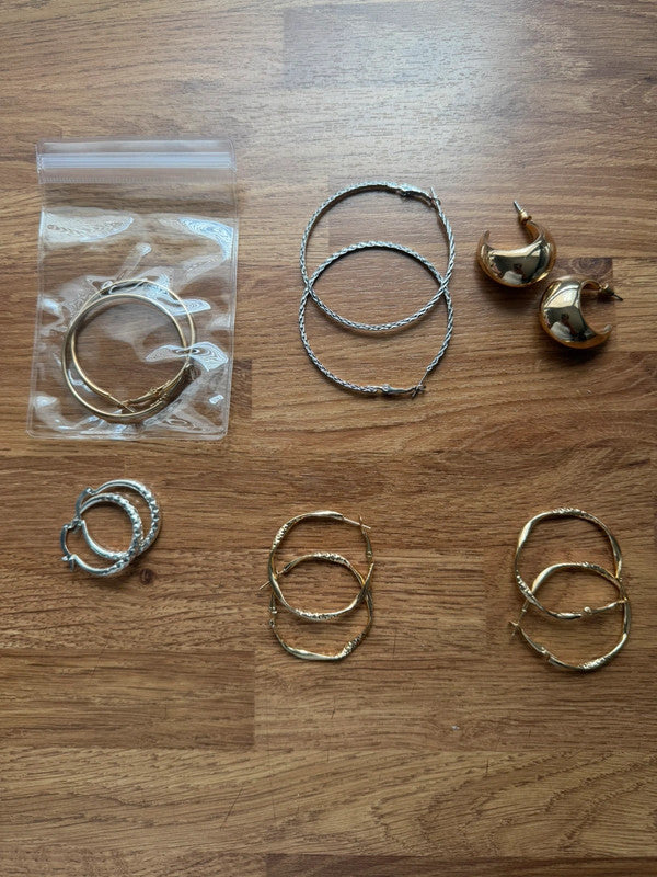 Y2K gold and silver large hoop earrings set, statement jewellery with shiny finish.