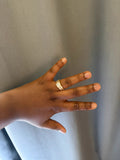Swarovski gold ring with cubic zirconia embellishments, size adjustable, pre-loved condition.
