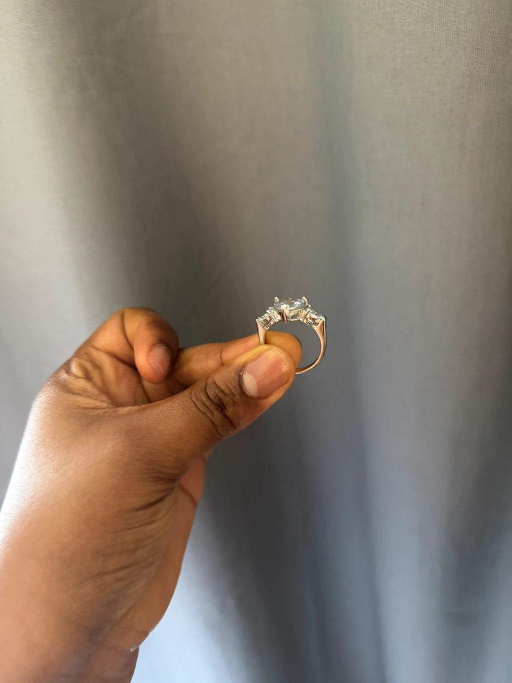 Silver heart-shaped ring with diamond-style embellishments, pre-loved condition.