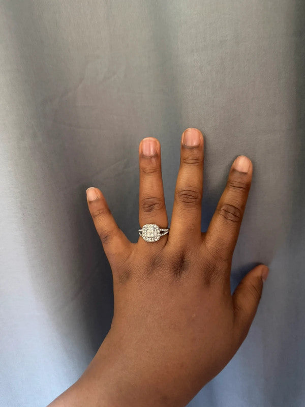Silver heart-shaped ring with diamond style detailing, pre-loved condition.