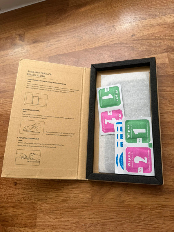 iPhone 16 tempered glass screen protector, unused, sealed packaging, clear material.