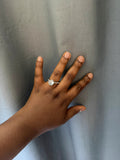Fashions silver statement ring with diamond-like embellishments, pre-loved engagement style.