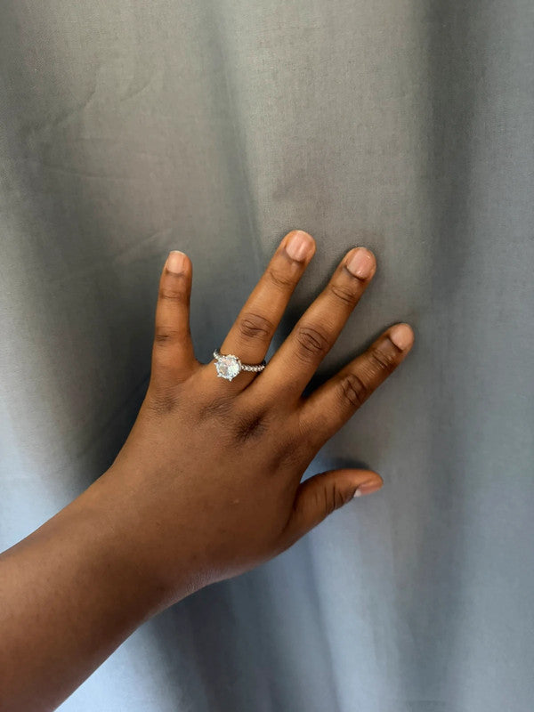 Fashions silver statement ring with diamond-like embellishments, pre-loved engagement style.