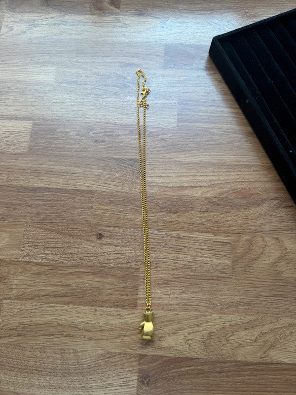 Hip Hop gold boxing glove pendant necklace with hip hop chain design.