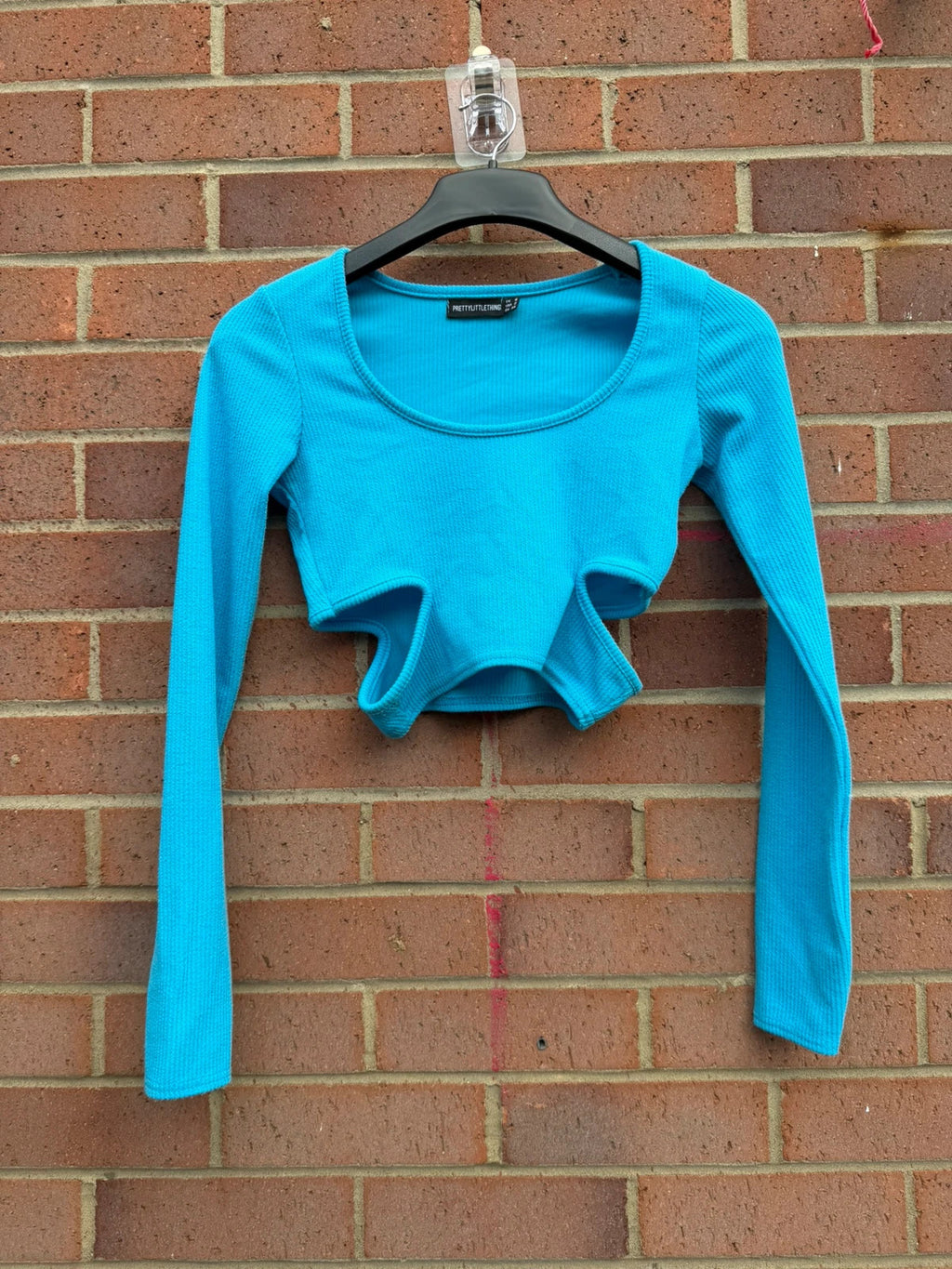 PrettyLittleThing blue cut out crop top, long sleeve bodycon style, size 6.