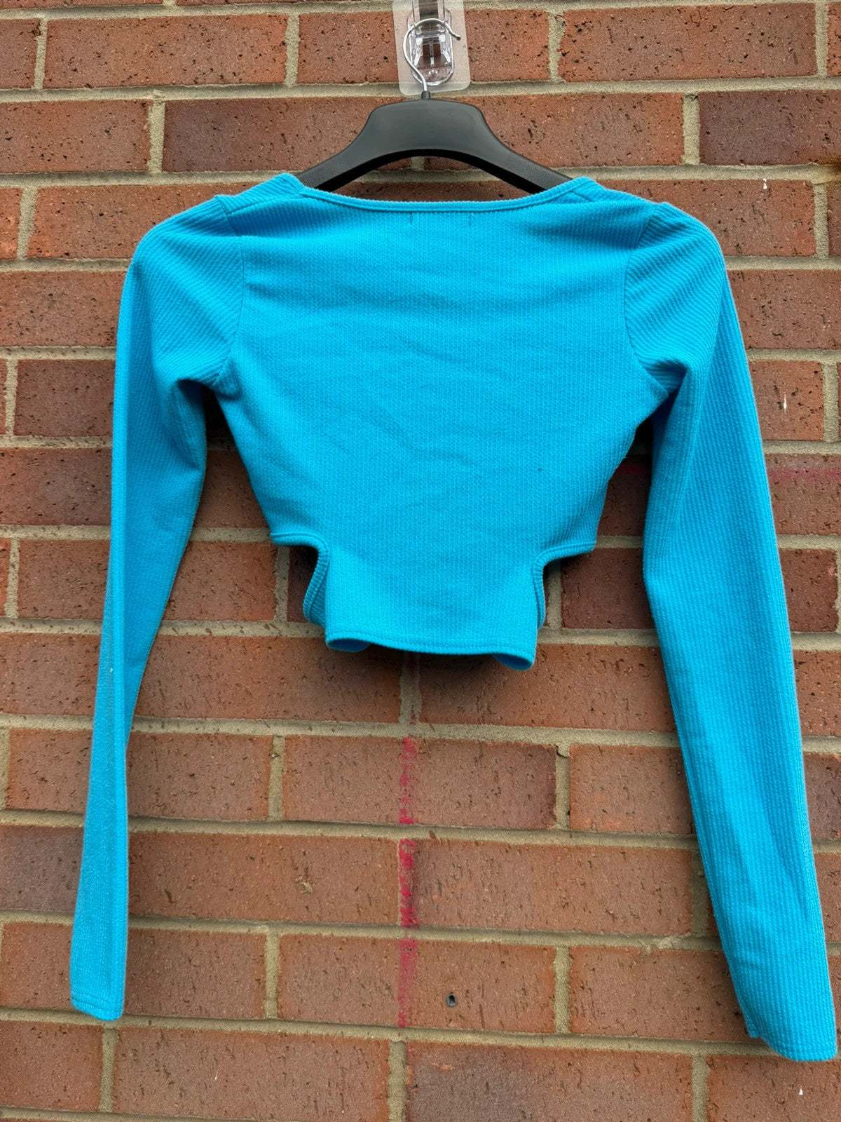 PrettyLittleThing blue cut out crop top, long sleeve bodycon style, size 6.