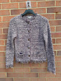 Per Una multi chunky knit cardigan with fringed hem and button-up front.