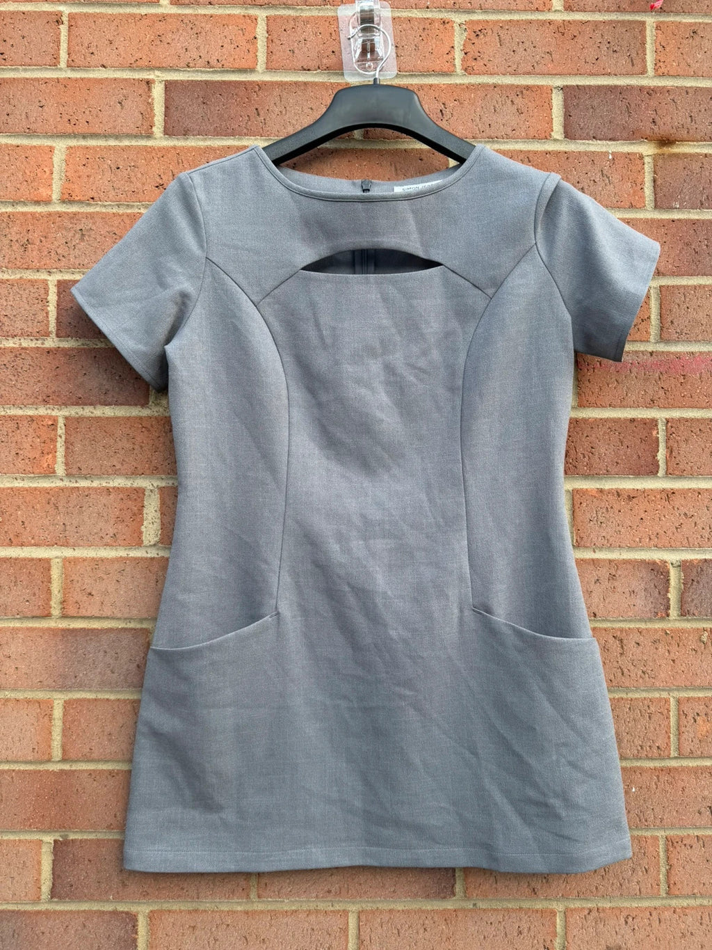 Simon Jersey grey bodycon mini dress with cut-out details, chic office style.