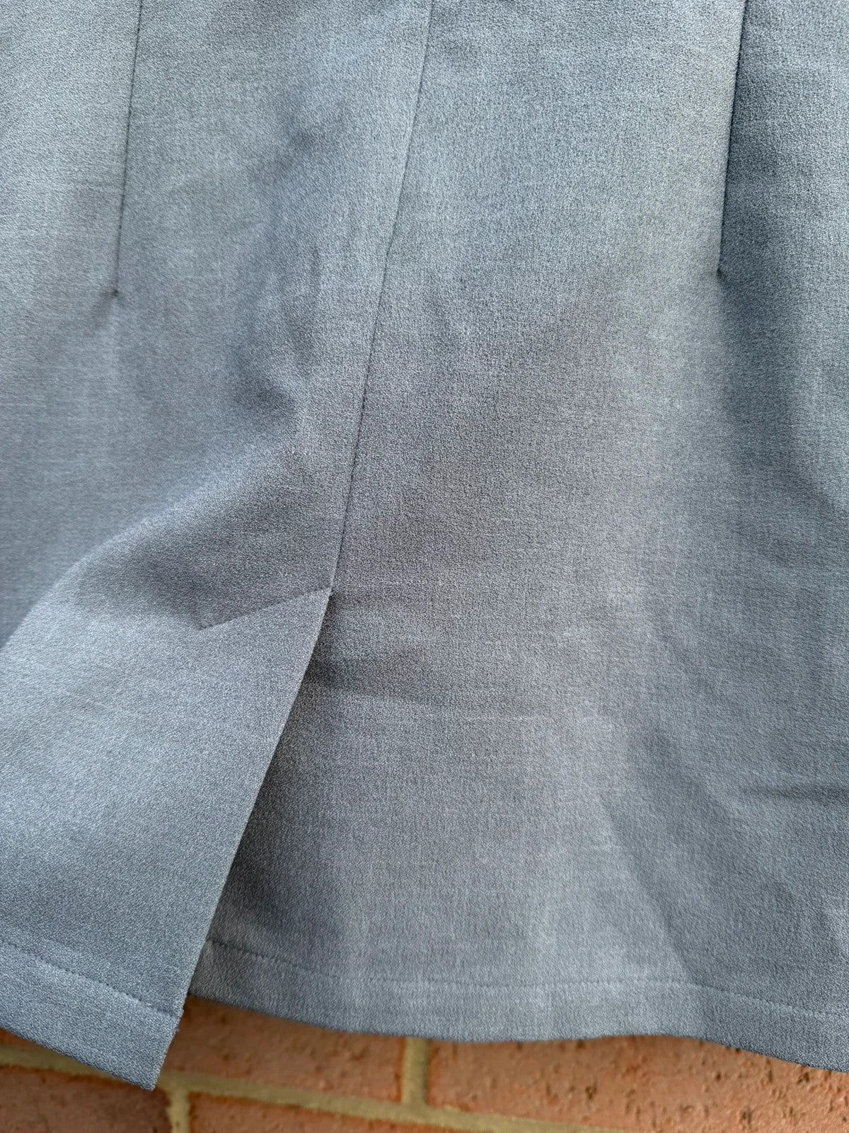 Simon Jersey grey bodycon mini dress with cut-out details, chic office style.