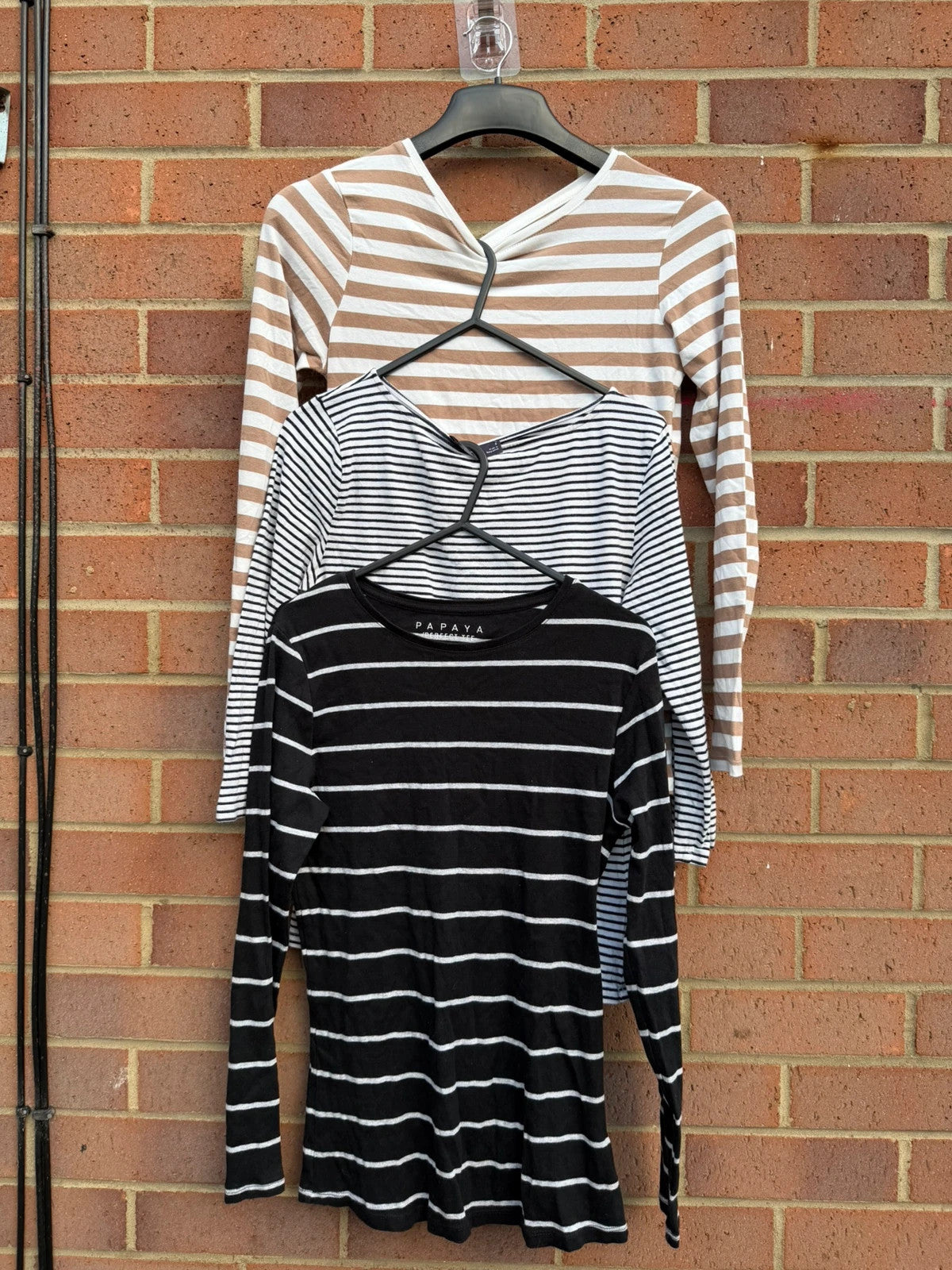 Primark multi-colour tunic blouses with monochrome stripes and soft fabric.