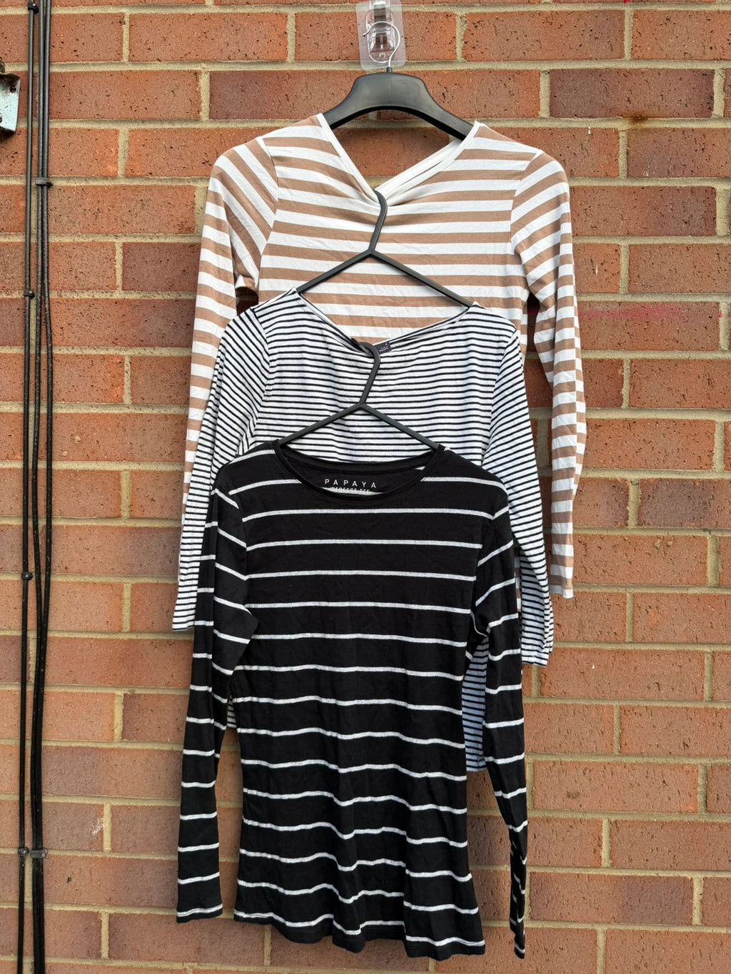Primark multi-colour tunic blouses with monochrome stripes and soft fabric.