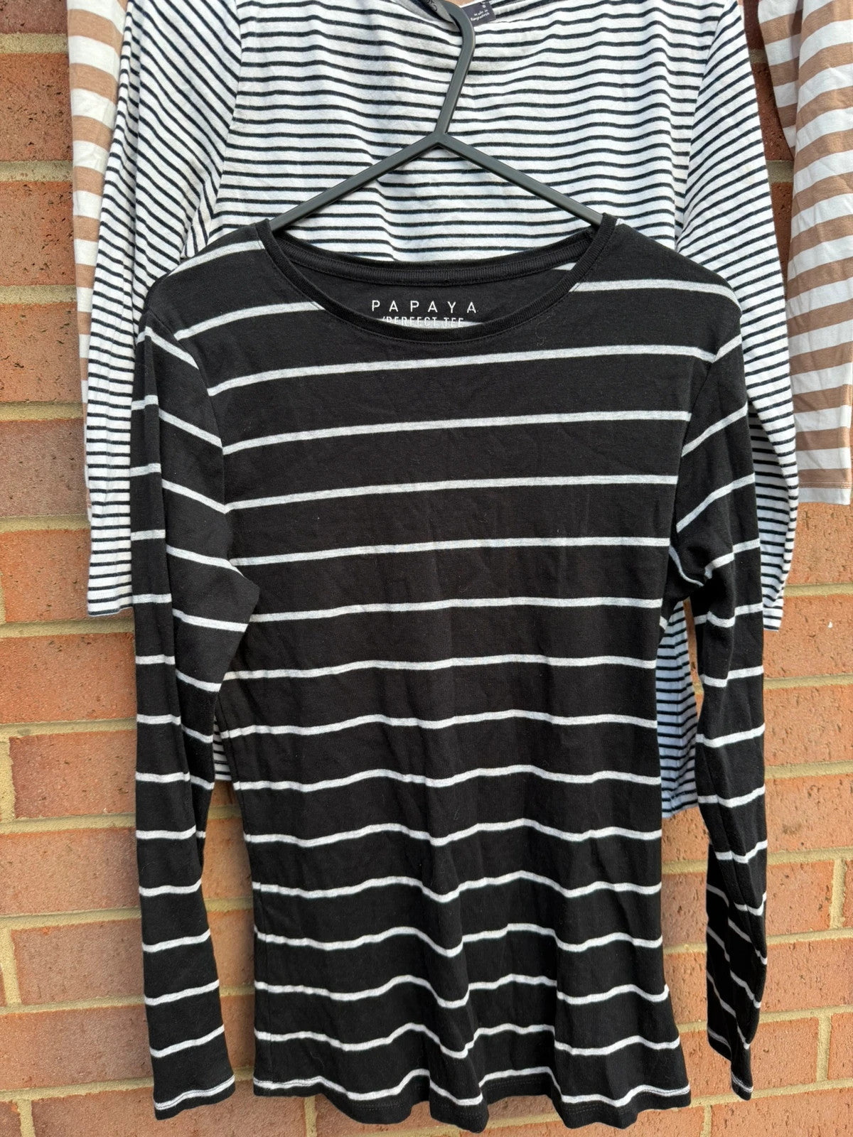 Primark multi-colour tunic blouses with monochrome stripes and soft fabric.