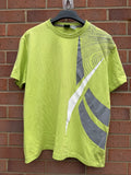 Reebok lime green oversized graphic tee with bold streetwear design and soft fabric.