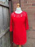 Pep&Co red bandage dress with lace detailing, elegant design for evening events.